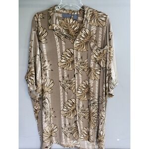 VTG Big Creek.Hawaiian shirt Size XL features a brown tropical pattern.